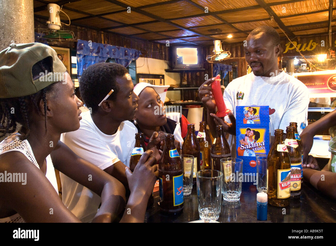 HIV/AIDS peers educator demonstrates the use of condoms Moshi Tanzania Stock Photo