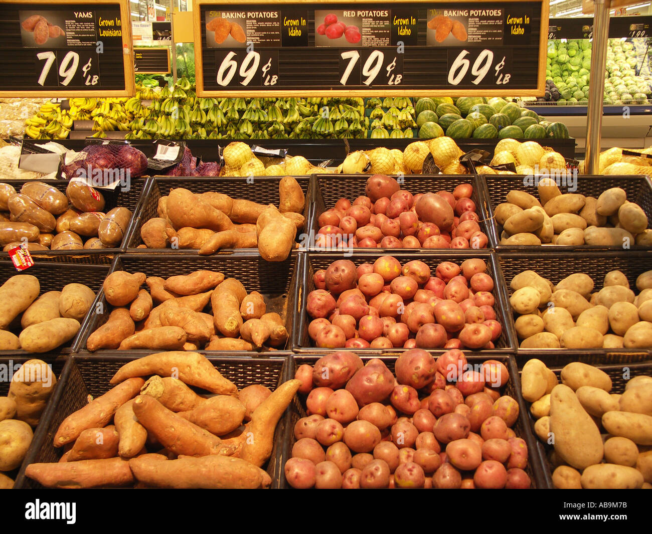Potatoes and Yams in Grocery Store Stock Photo Alamy