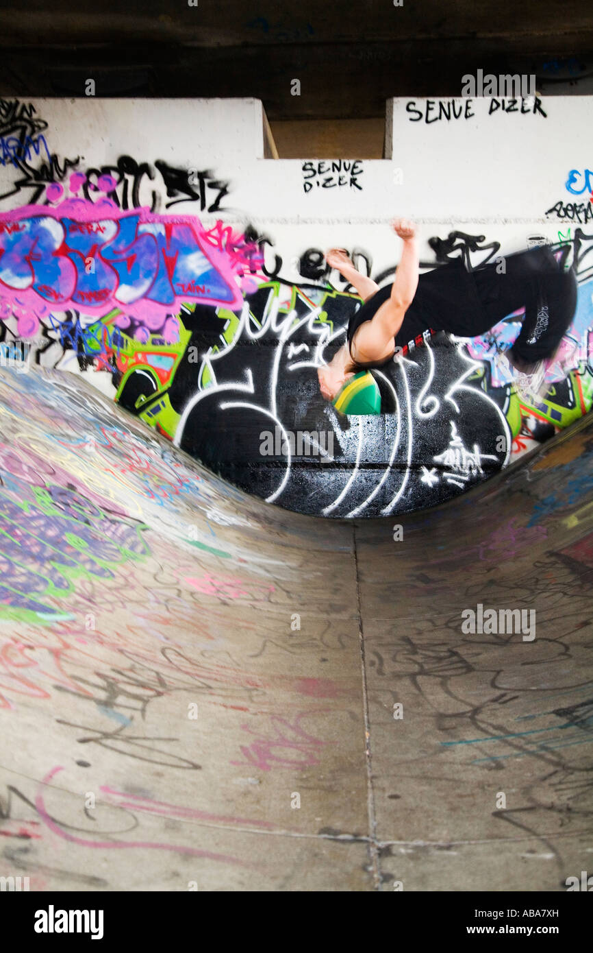 Young man doing back somersault Stock Photo - Alamy