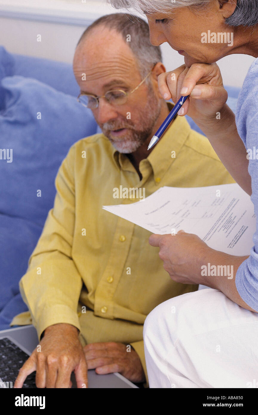 Couple working together Stock Photo