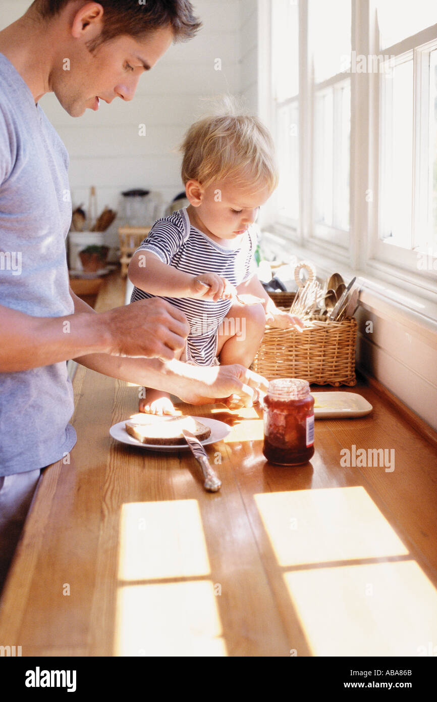 Father and child having breakfast Stock Photo