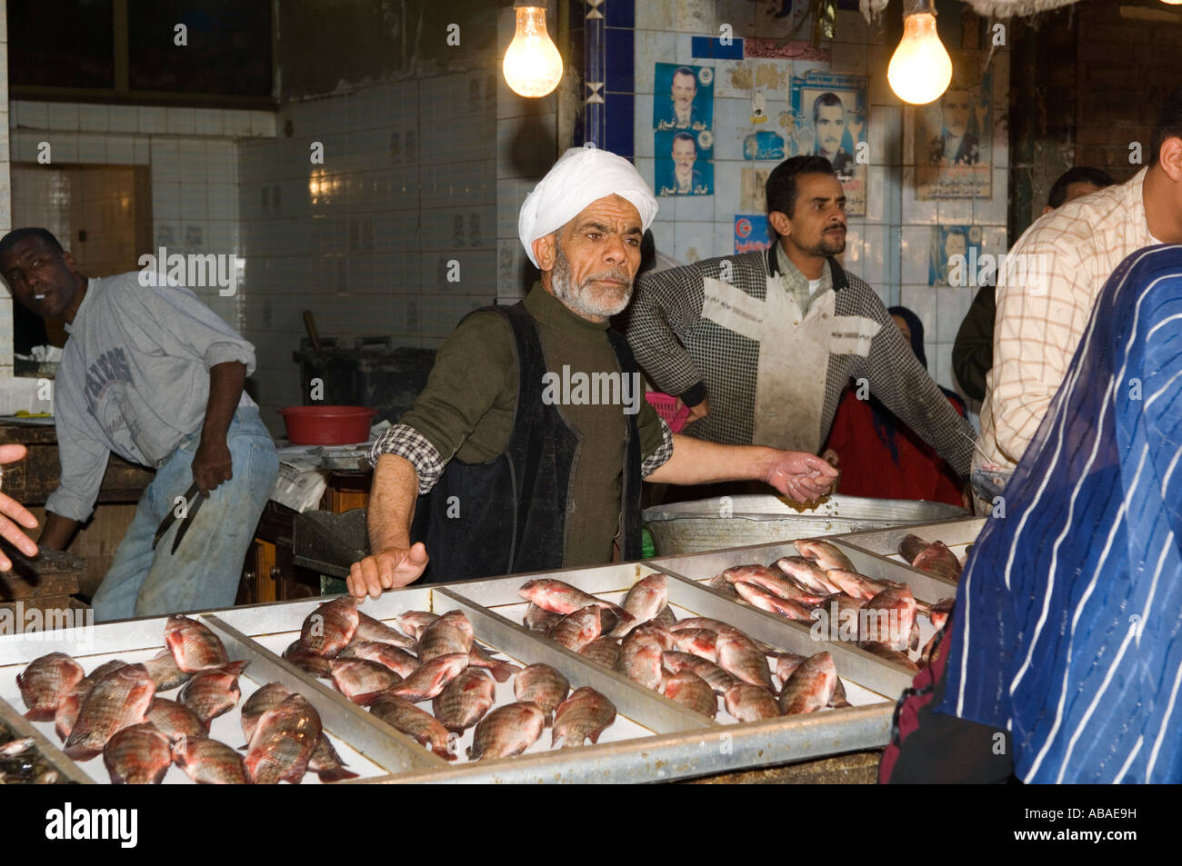 man selling fish in the market, Streetscene, Alexandria, Egypt Stock