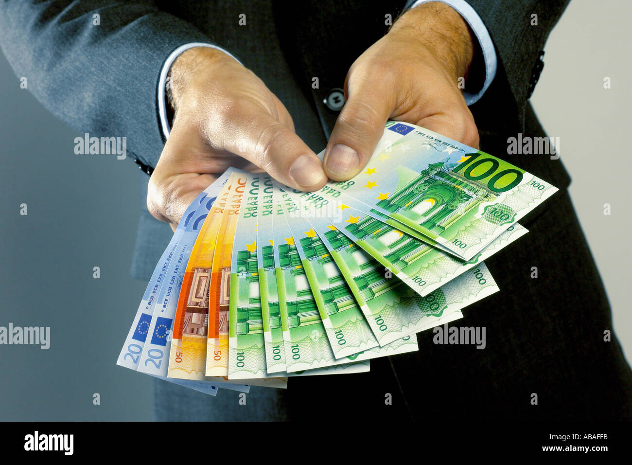 Man holding banknotes Stock Photo