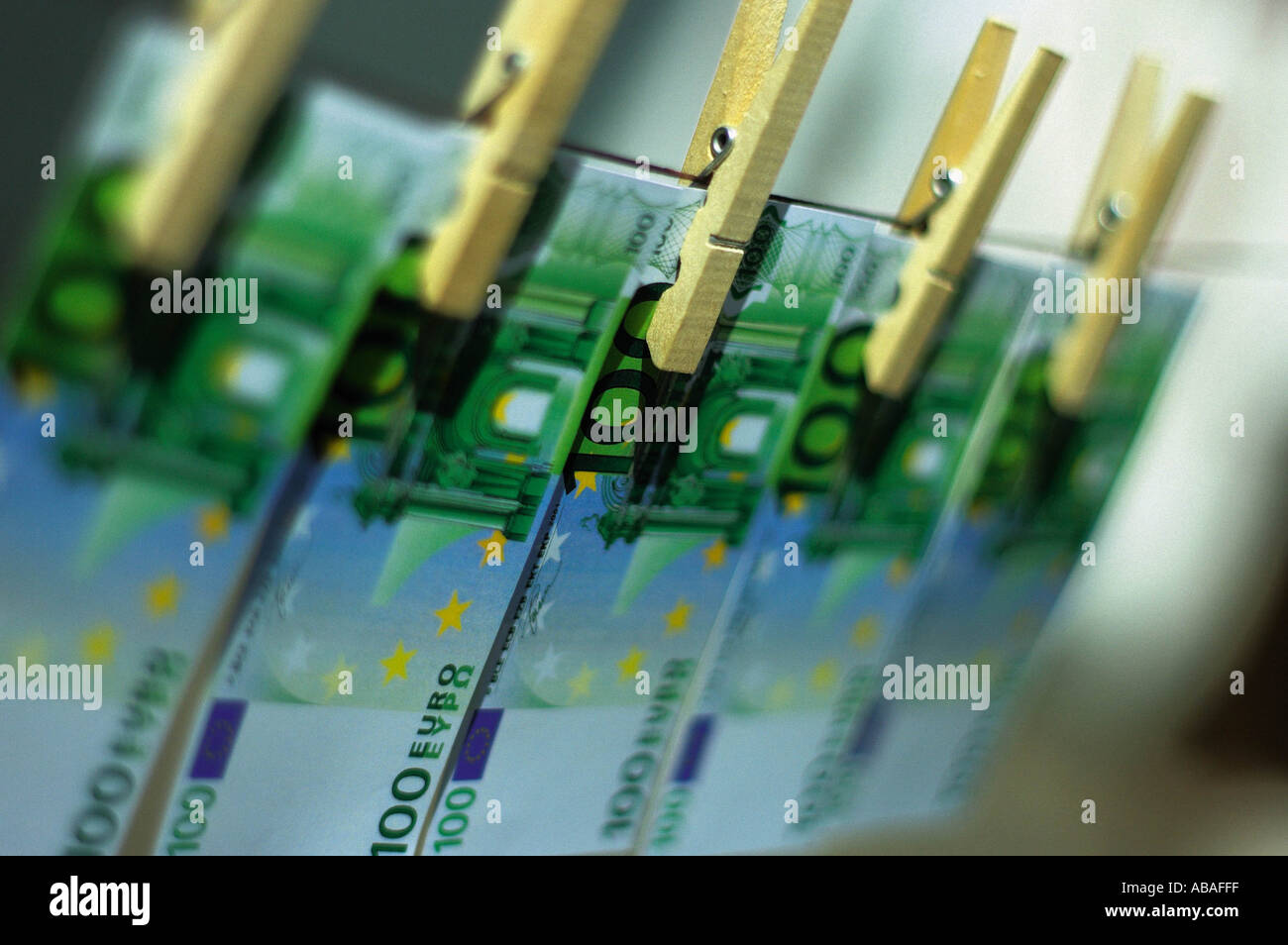 Money on clothes line Stock Photo