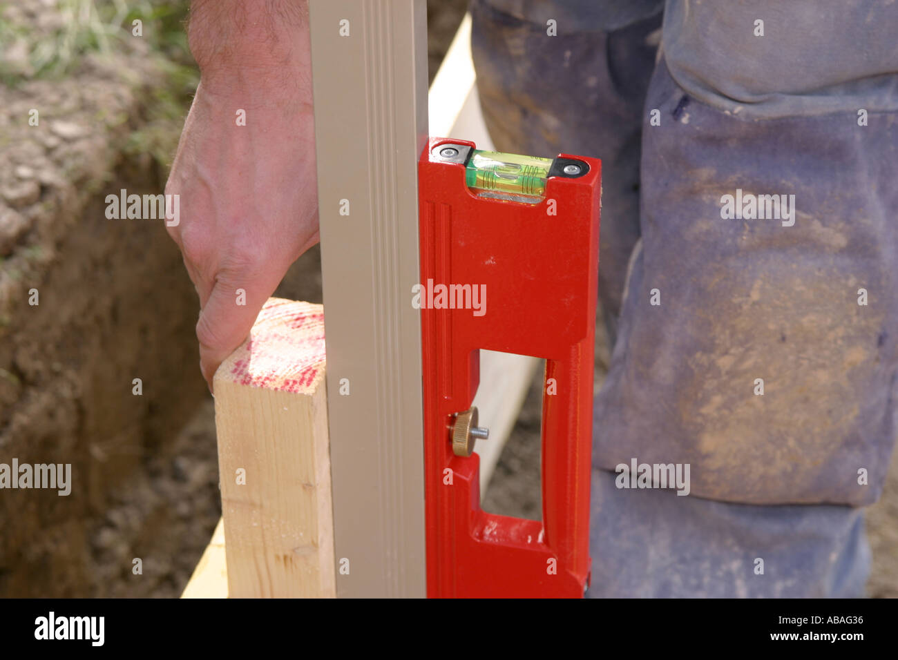 Using a water level tool Stock Photo Alamy