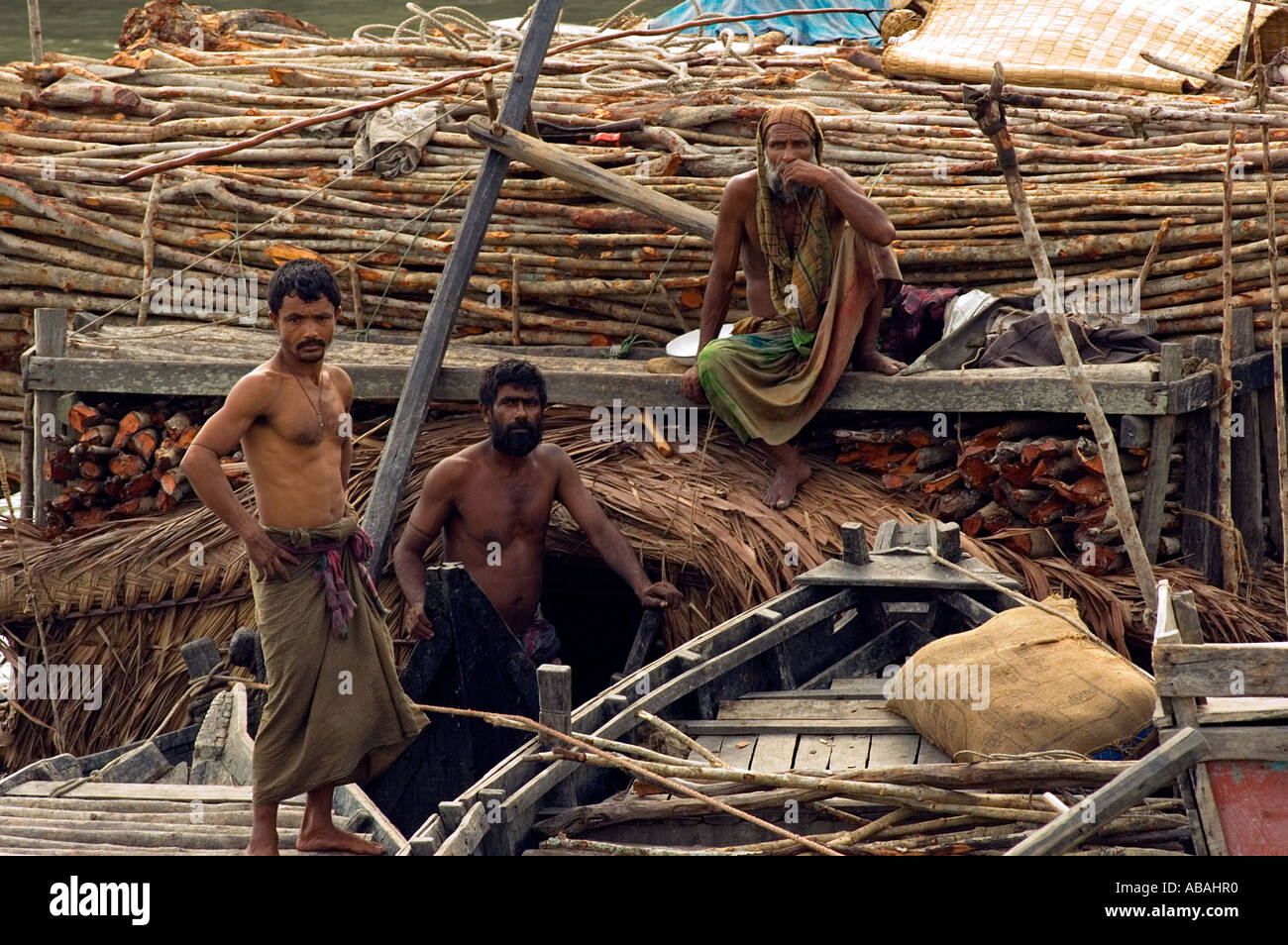 Illegal wood collecting boats in Sunderbans Unesco Heritage Site , Bangladesh . Stock Photo