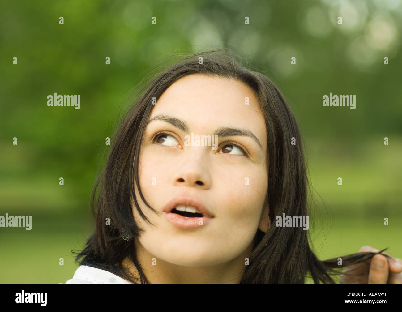 Woman looking up with mouth open Stock Photo