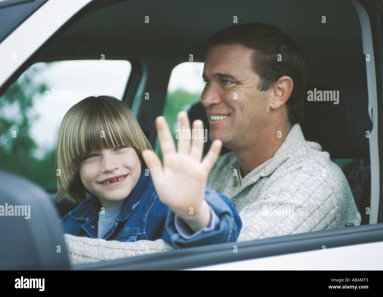 Child sitting on lap in car cheap