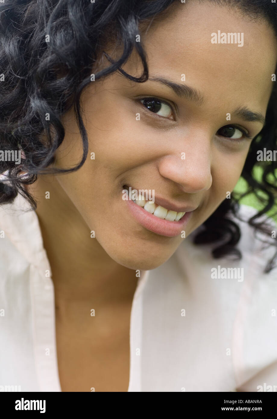 Medium shot young curly haired hi-res stock photography and images - Alamy