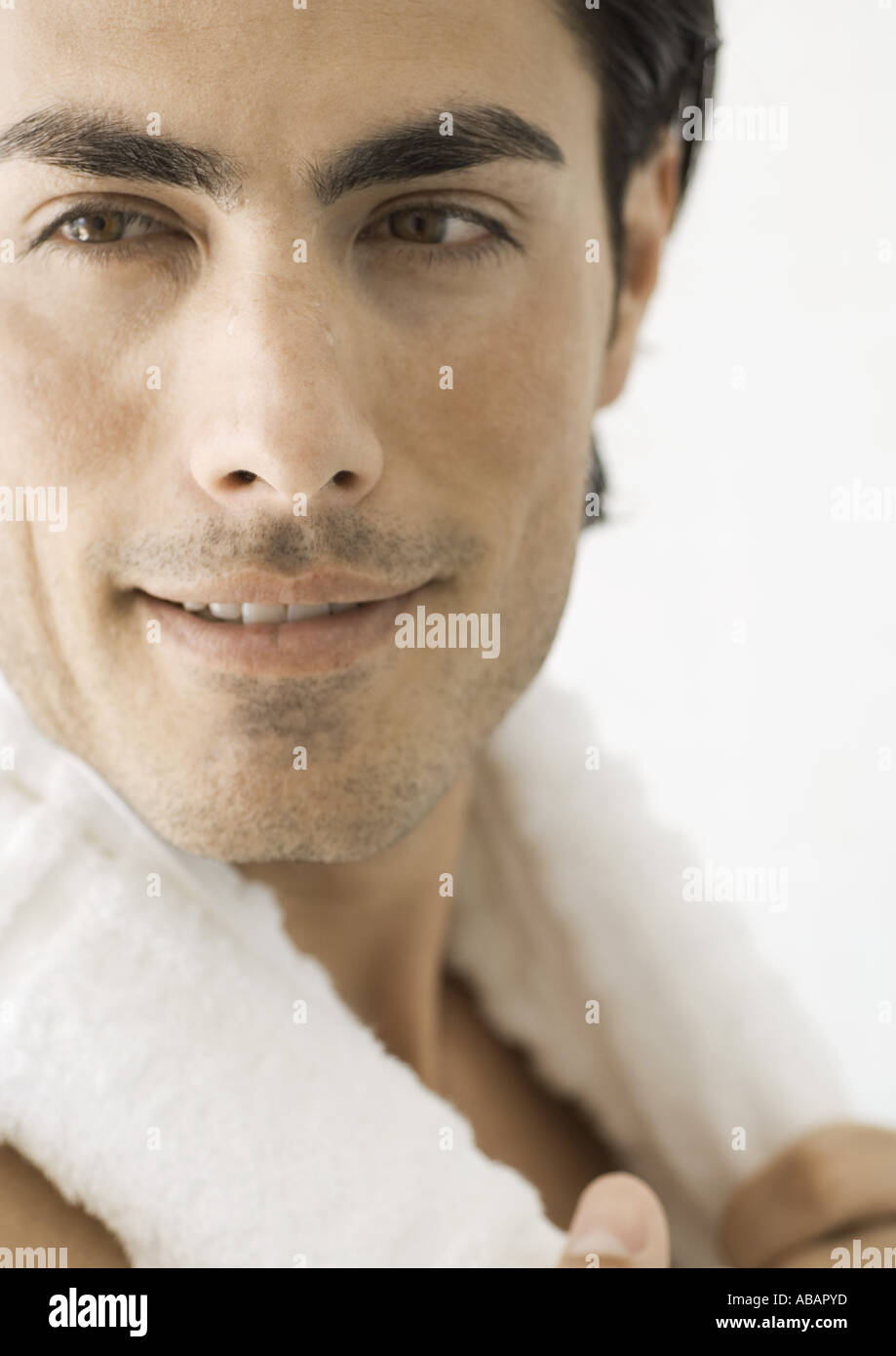Man with towel around neck, close-up Stock Photo