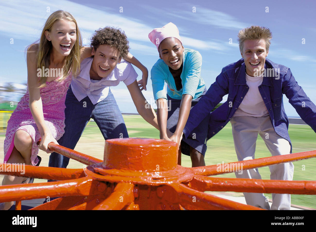 Group spinning roundabout Stock Photo Alamy
