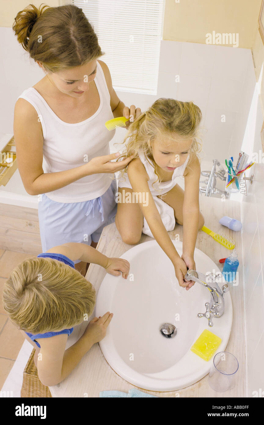 Family in bathroom Stock Photo Alamy