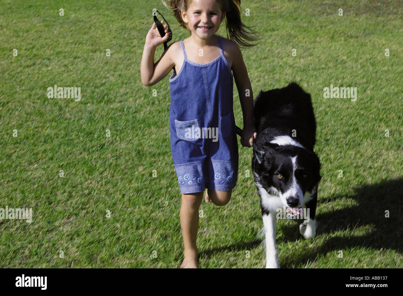 Girl with a dog hi-res stock photography and images - Alamy