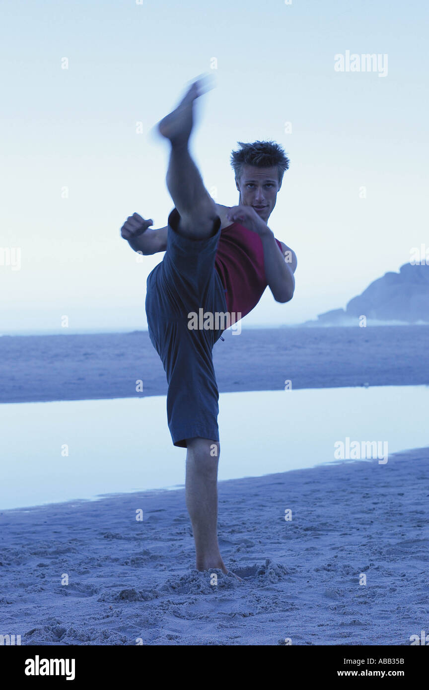 Eye contact kicking with the leg hires stock photography and images