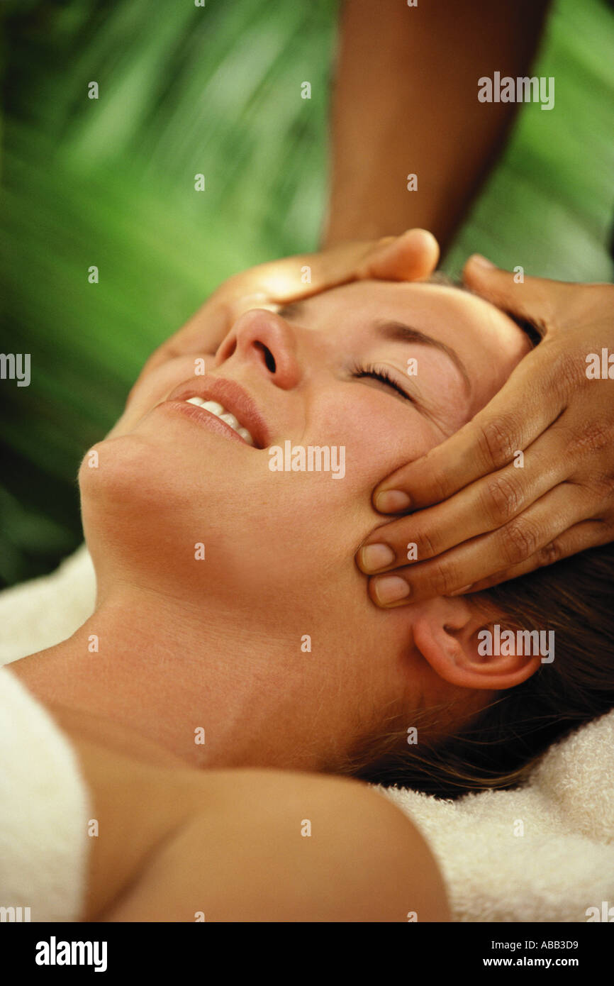 Woman having head massage Stock Photo