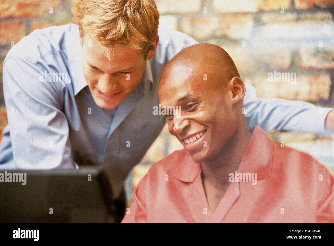 Businessmen working on computer Stock Photo