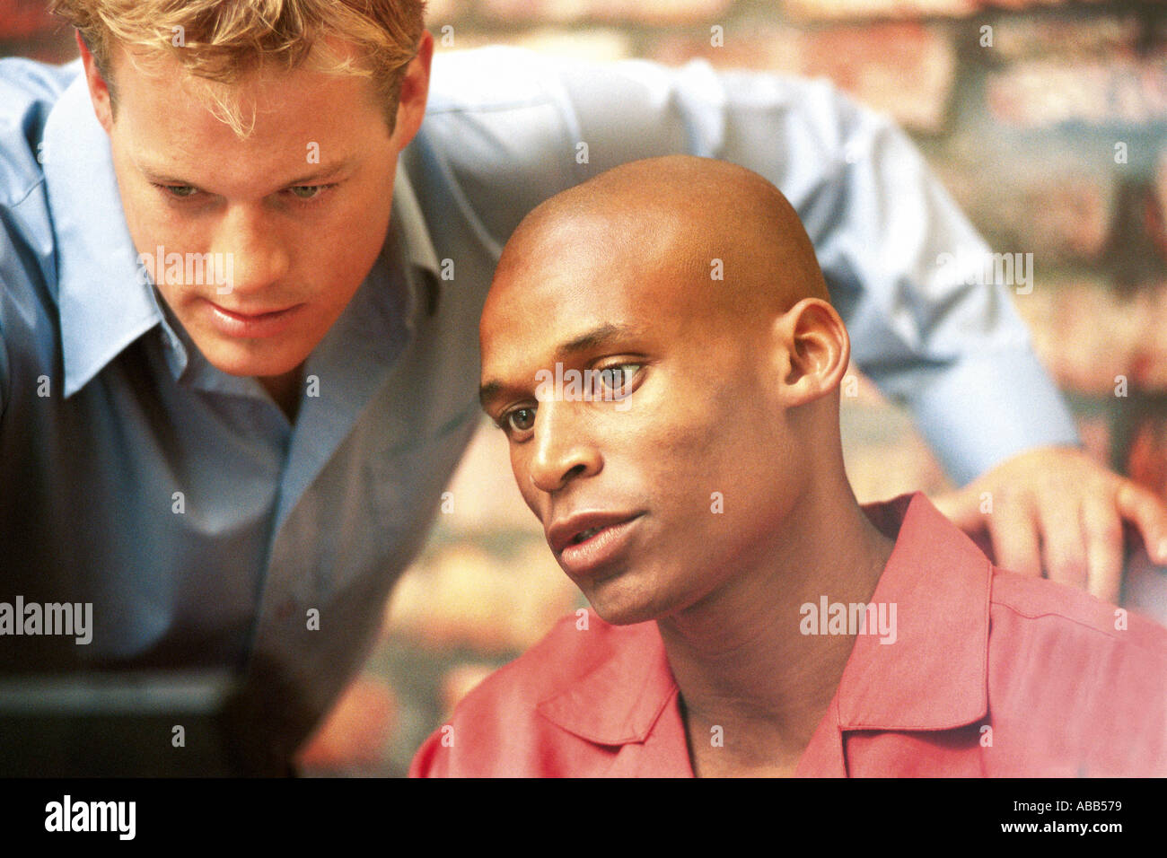 Businessmen working on computer Stock Photo