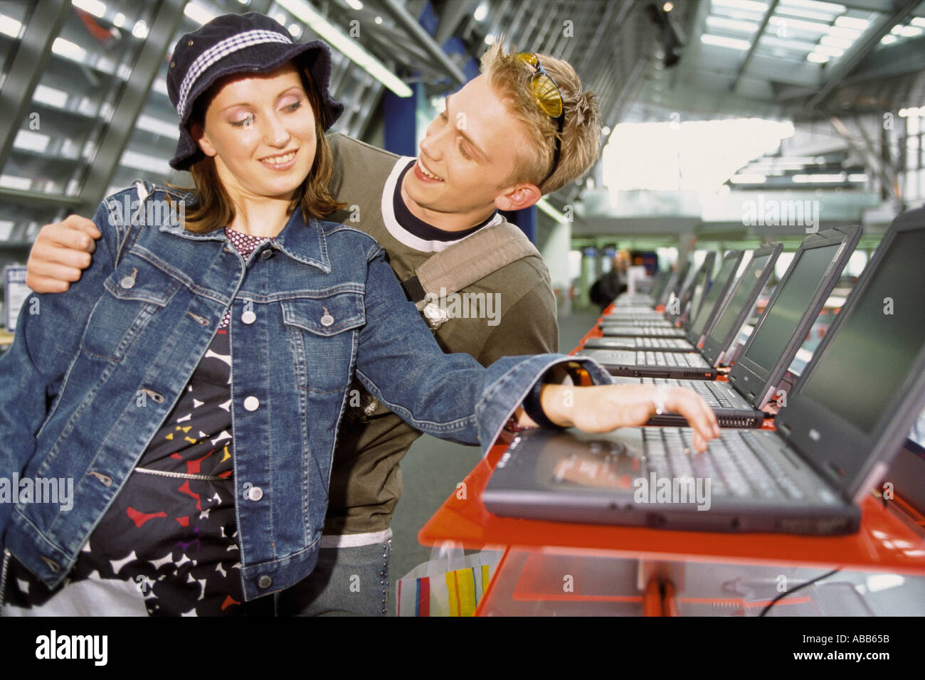 Two teenagers laughing indoors hi-res stock photography and images - Alamy