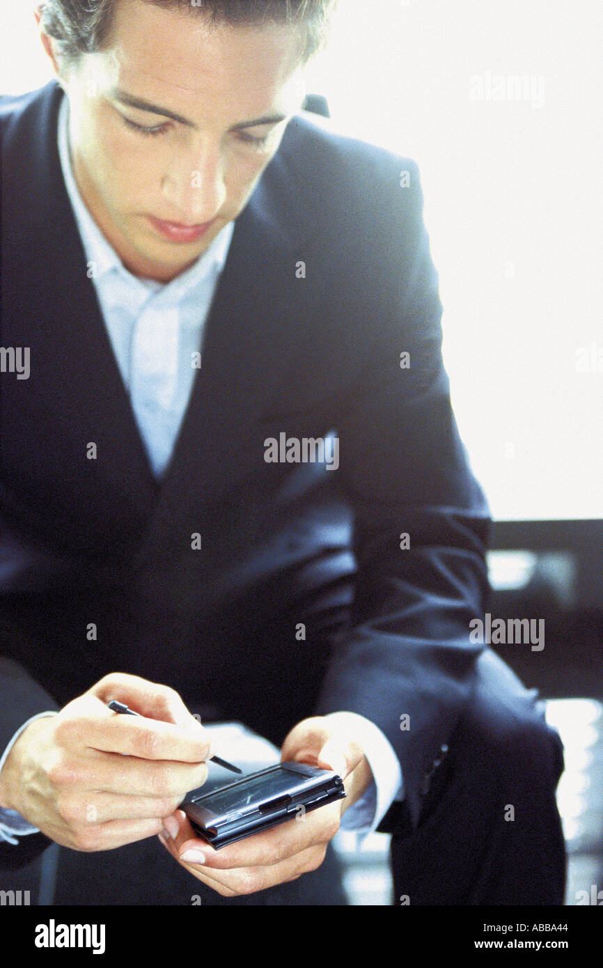 Businessman with palmtop Stock Photo