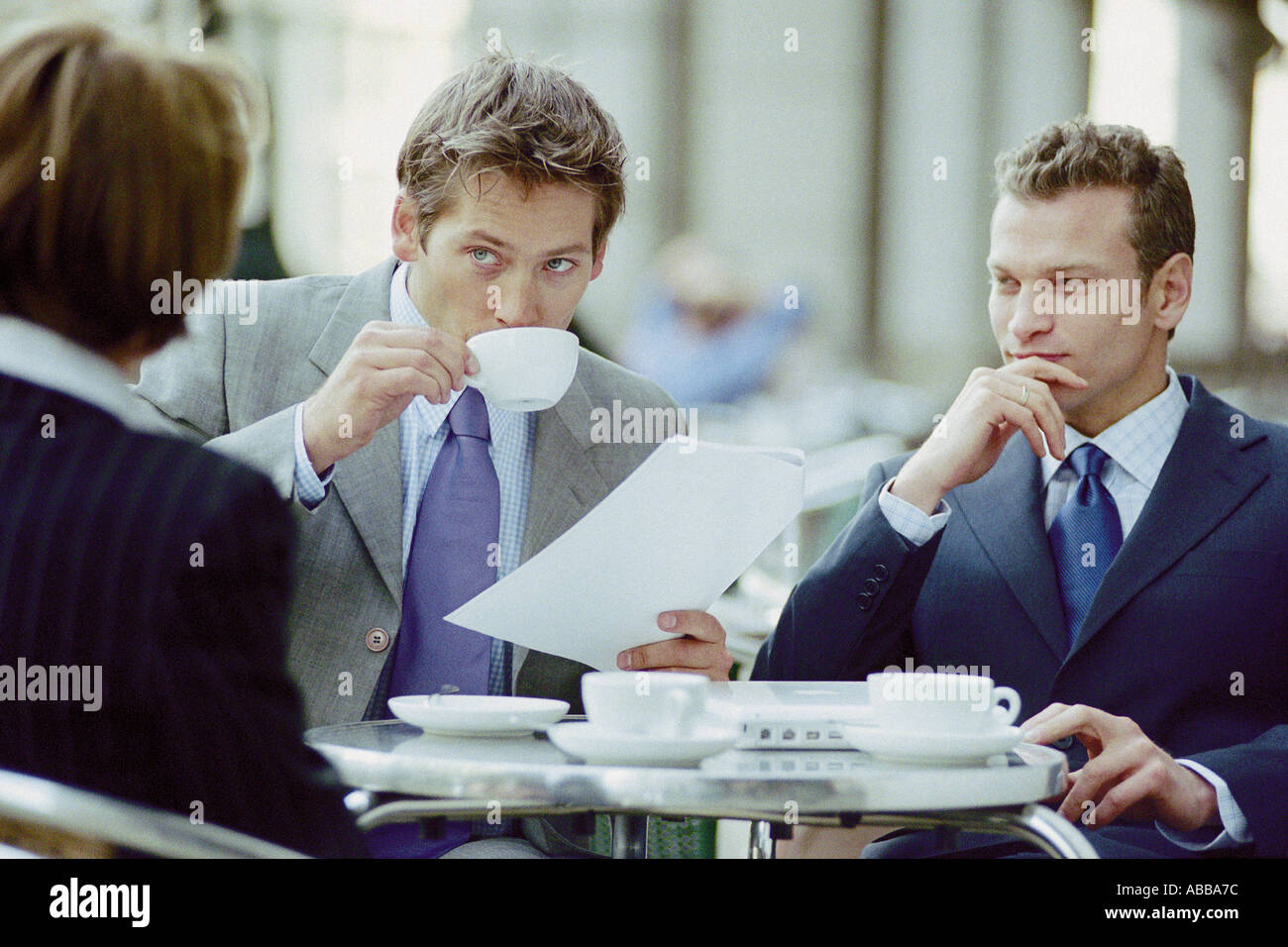 Businesspeople having meeting at cafe Stock Photo