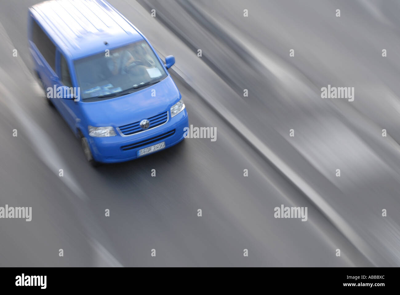blue VW van volkswagen car in motion running too fast high speed