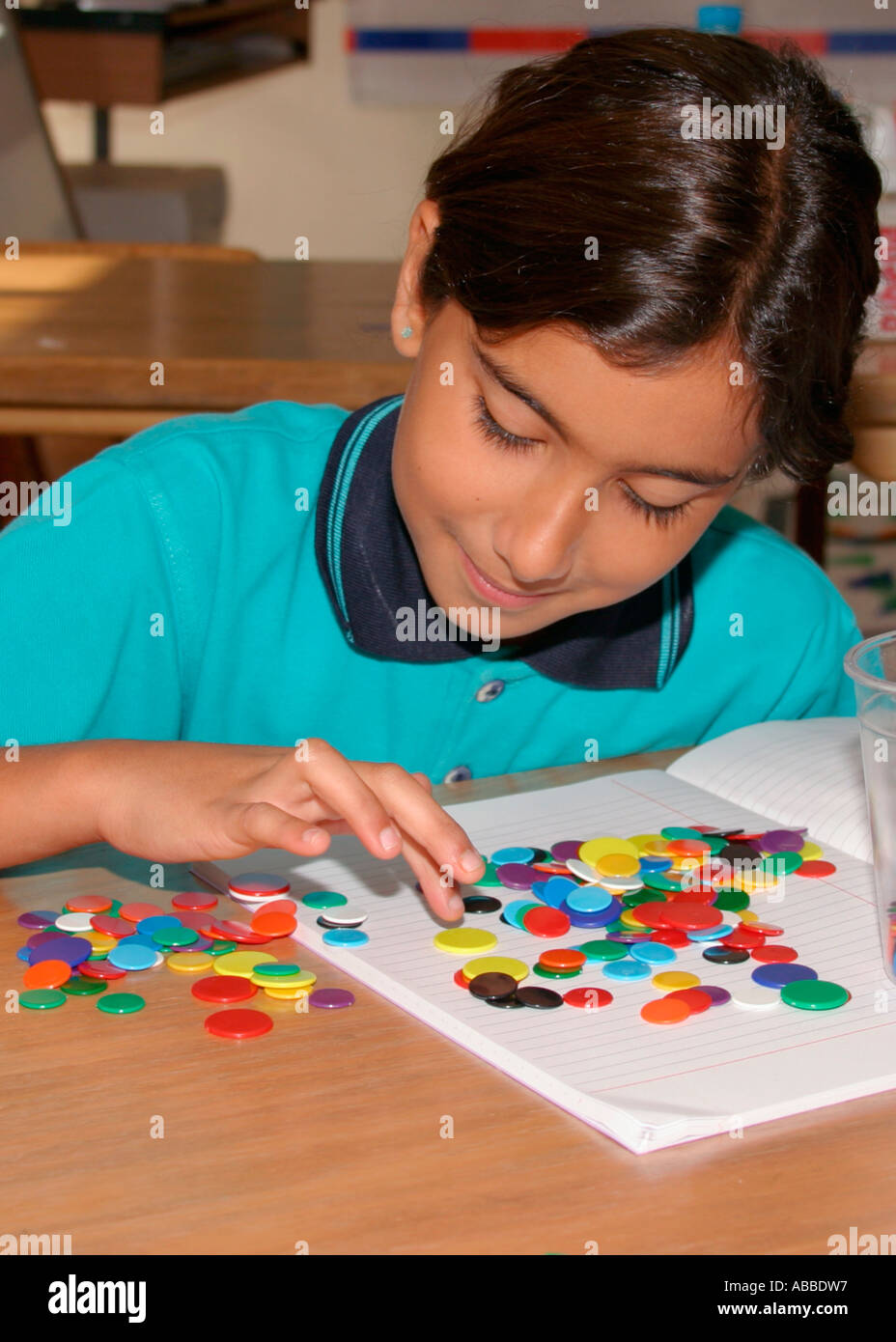 School Girl Counting In Maths Lesson Stock Photo