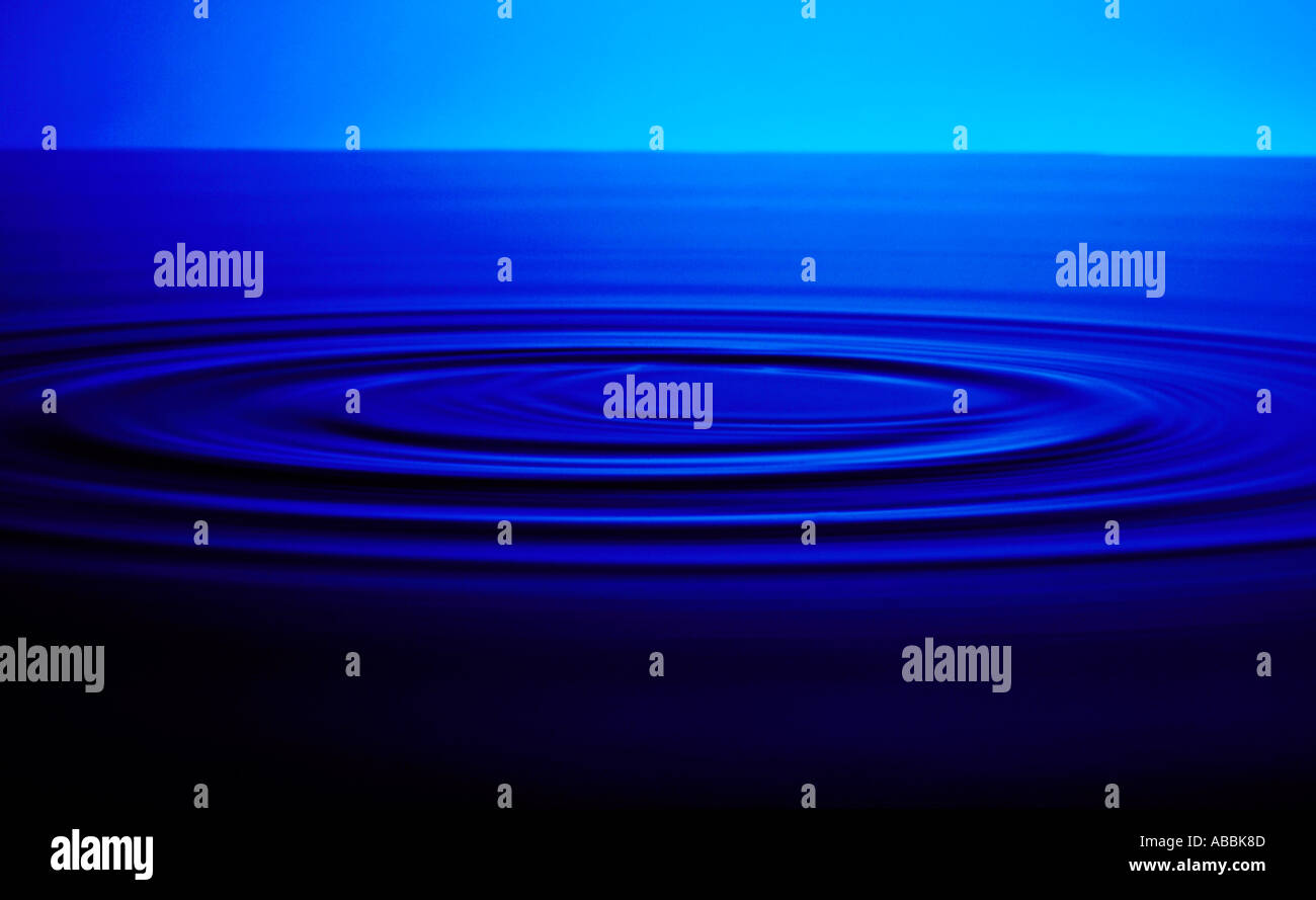 Ripples on still water Stock Photo - Alamy