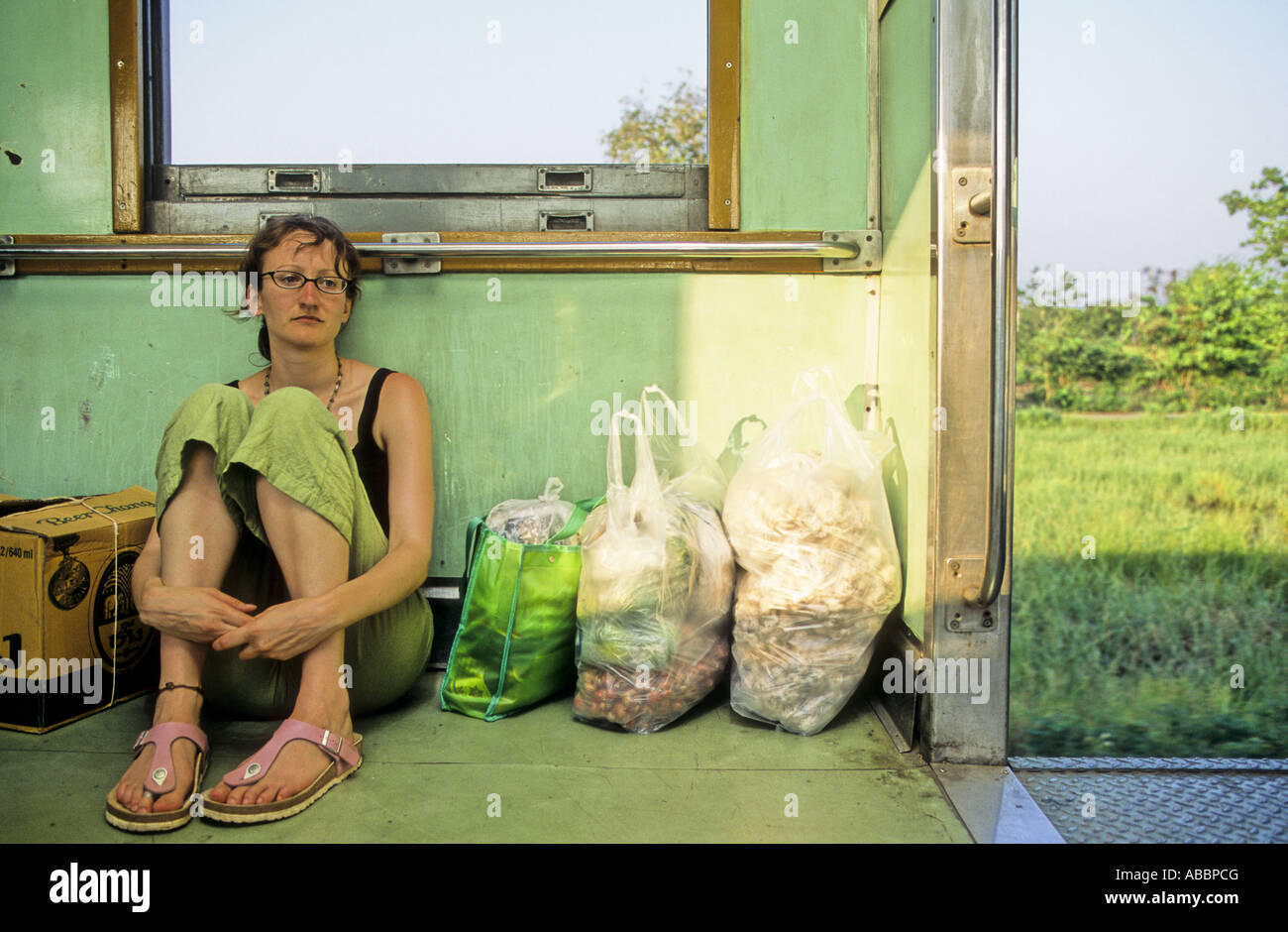 Girl traveling on a train in Thailand Stock Photo Alamy