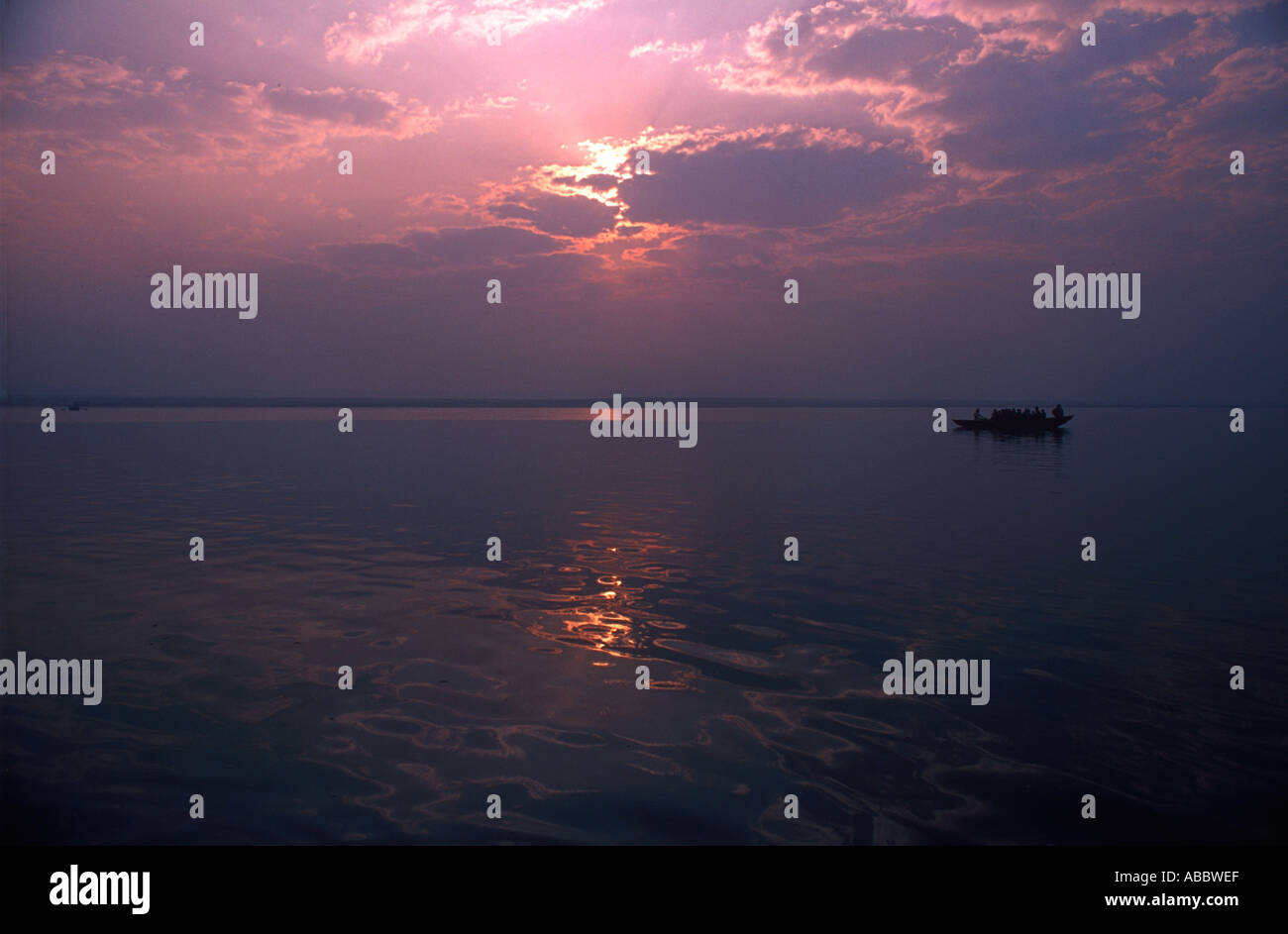 CMP70352 Sunrise at river ganges in the oldest Indian city Banaras now Varanasi Uttar Pradesh India Stock Photo