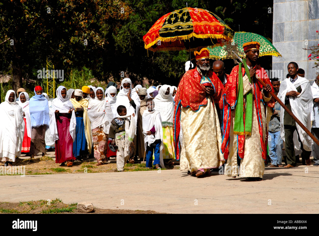 Ethiopian Orthodox Christianity procession of priests and believers with colourful umbrellas around the New Cathedral Stock Photo