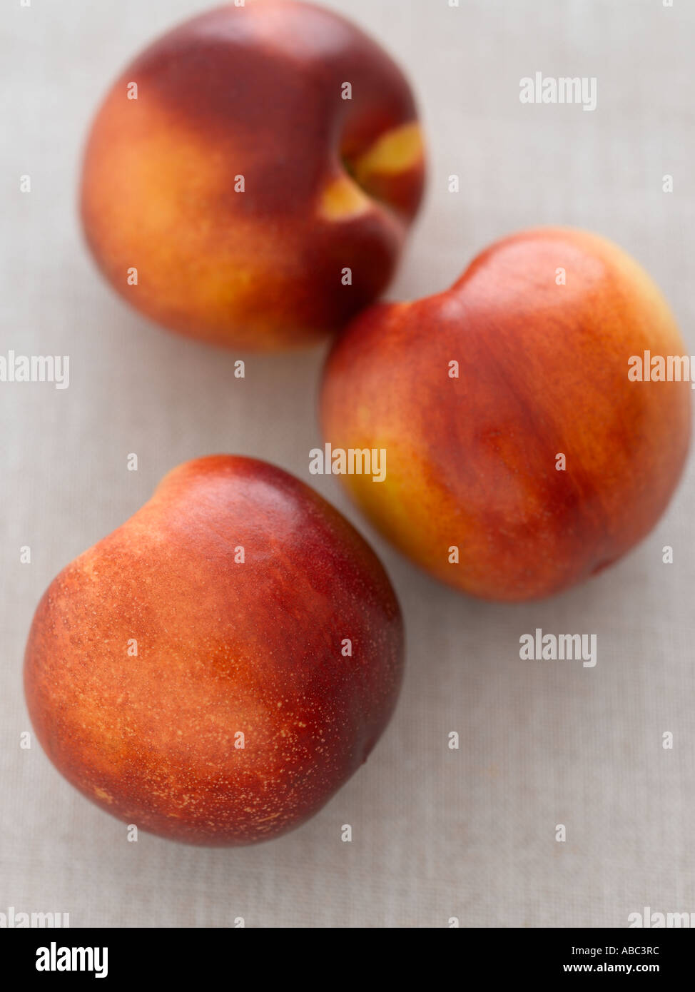 Nectarines on linen - 61mb high end Hasselblad digital image Stock Photo