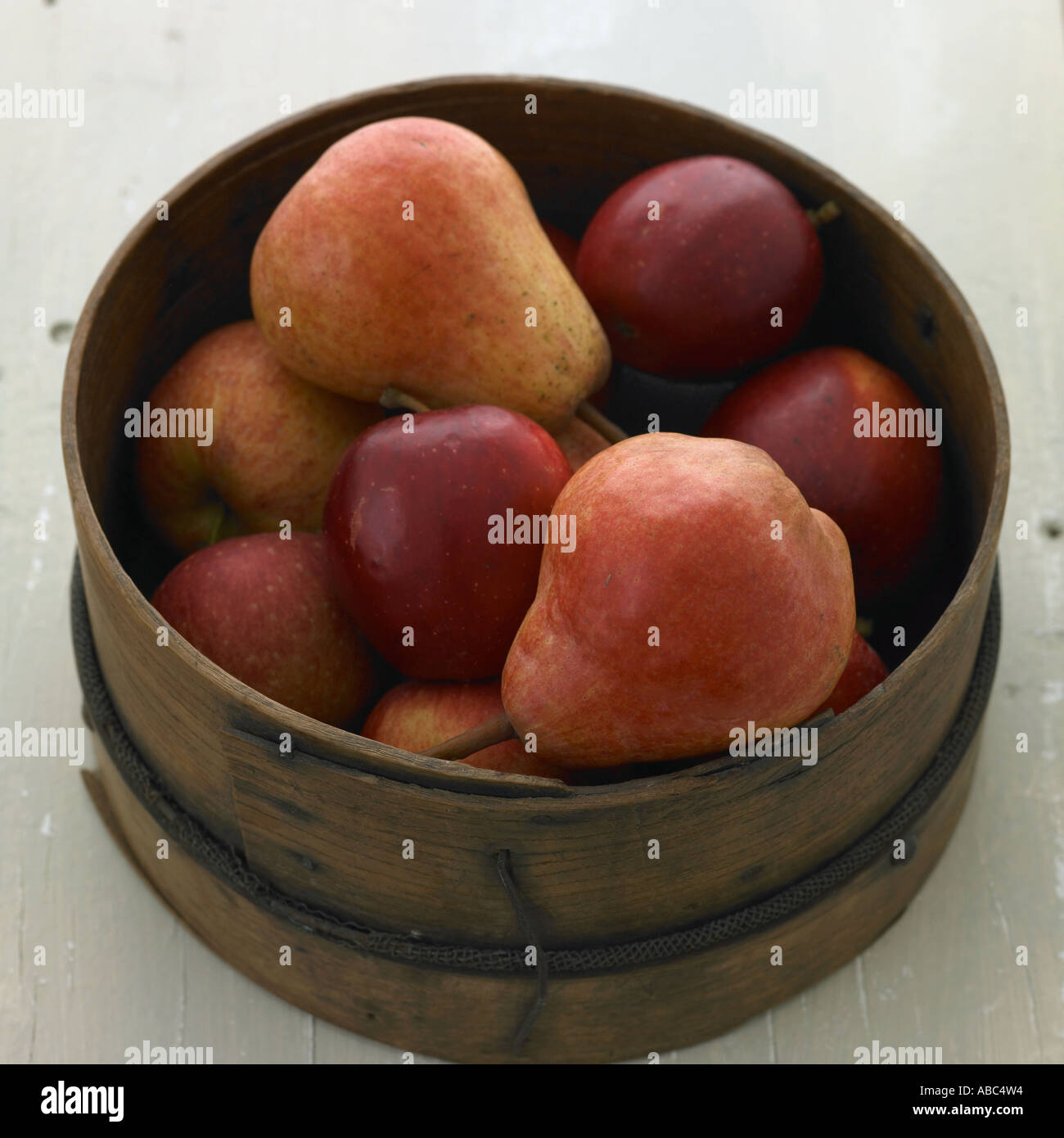 Apples and pears in wooden box Stock Photo