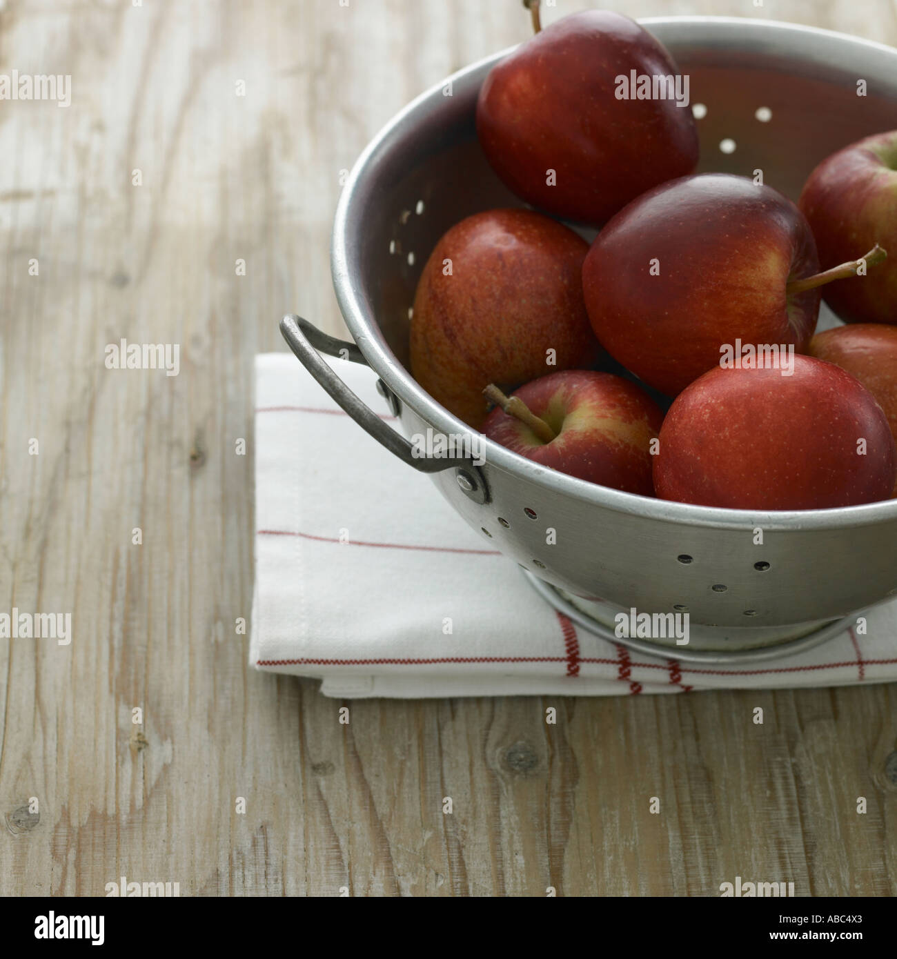 Red apples in colander Stock Photo - Alamy