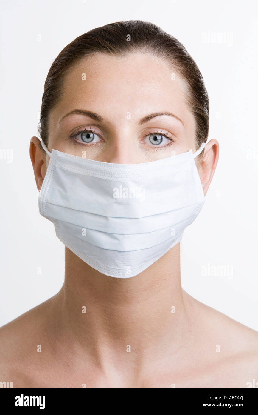 Wearing a surgical light blue mask hi-res stock photography and images ...
