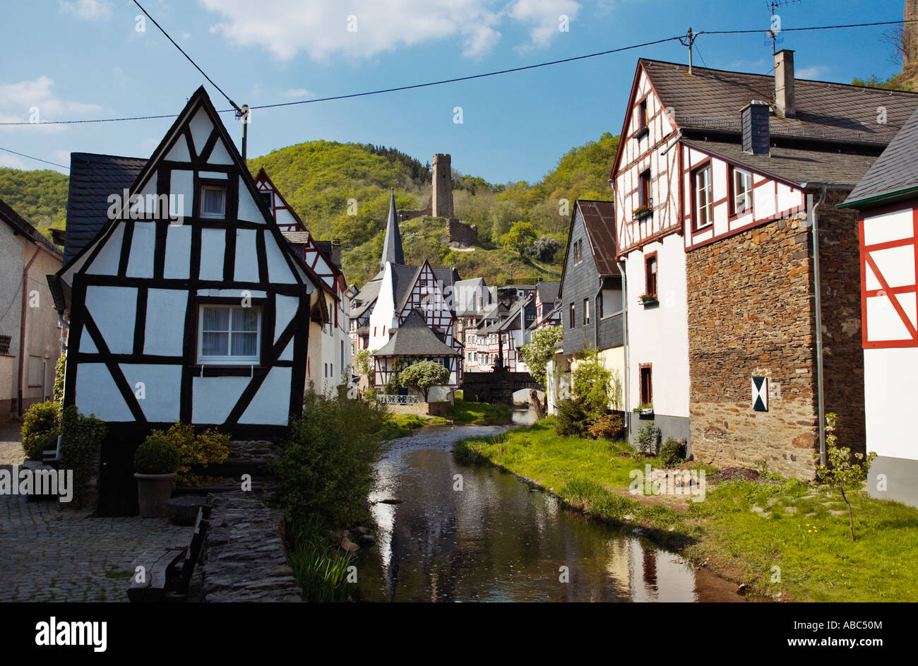 River Elz with Castle Resch ruins above tiny village of Monreal Germany Europe Stock Photo