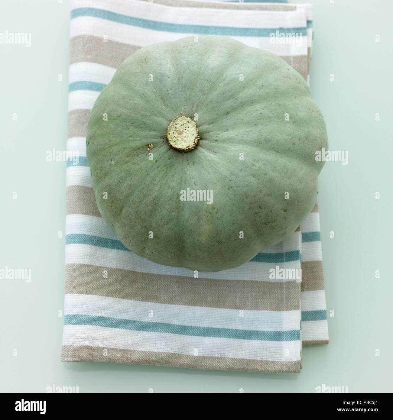 Squash on striped towel Stock Photo
