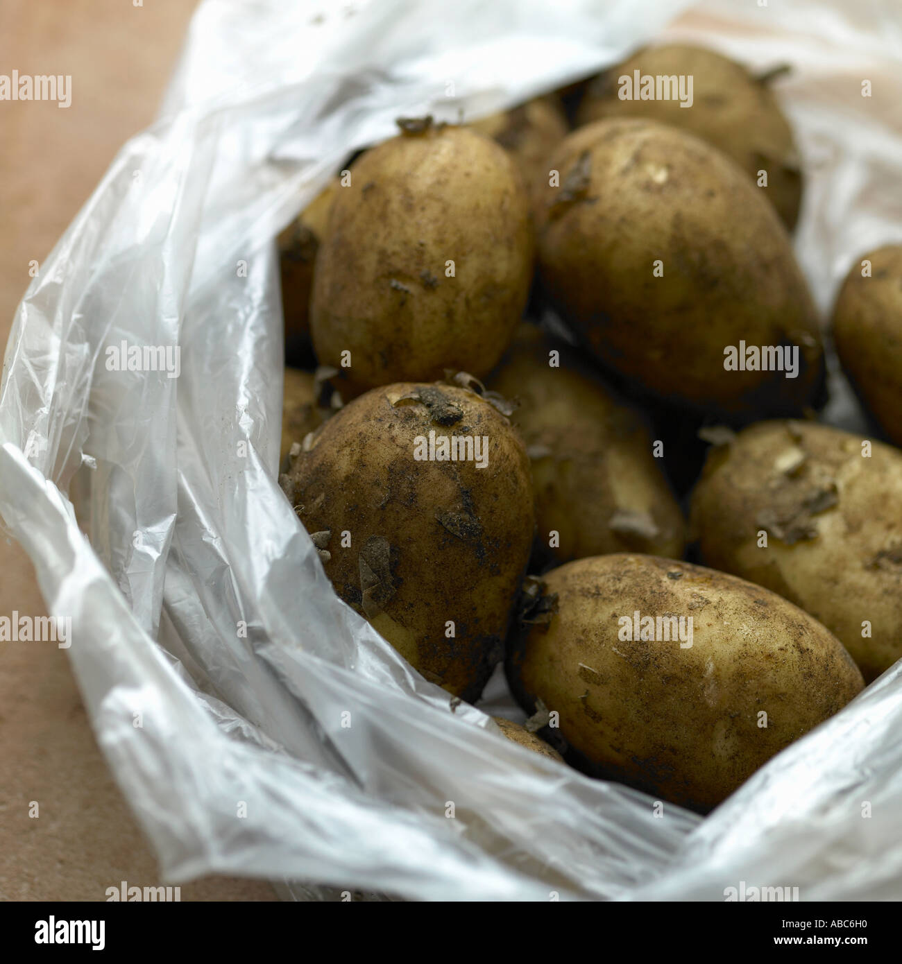 New potatoes in plastic bag Stock Photo Alamy
