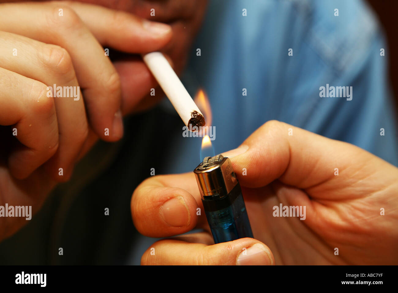 Lighting a cigarette Stock Photo Alamy