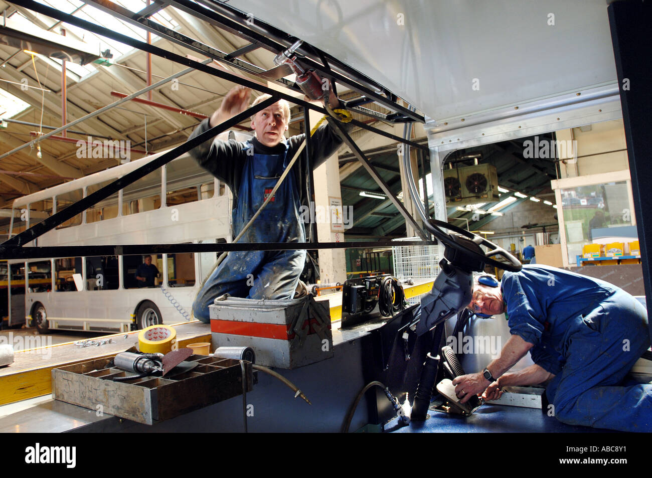 Assembly workers at bus and coach manufacturing company East Lancashire Coachbuilders in