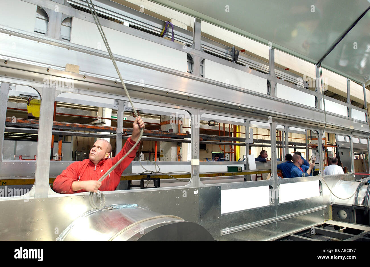 Assembly worker at bus and coach manufacturing company East Lancashire