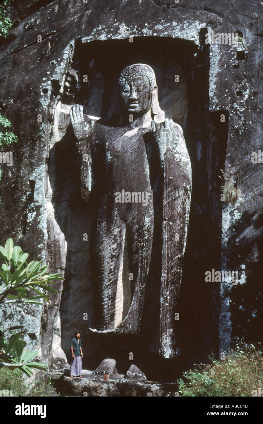 Ancient architecture. Standing Buddha. Sasseruva, Sri Lanka. Stock Photo