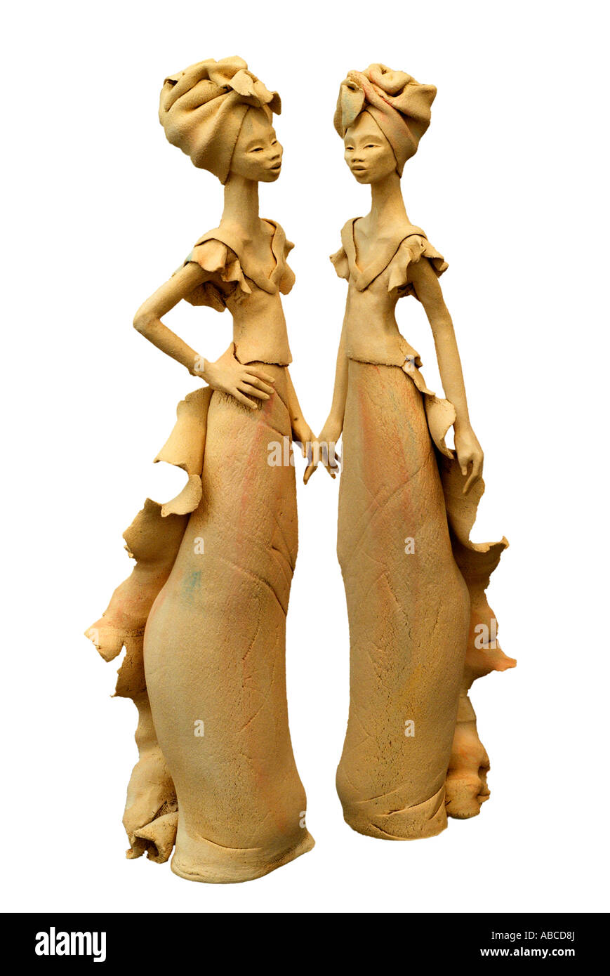 Figurative African female women form stand standing  tall thin elongated elegant figure carrying possession figures character tr Stock Photo