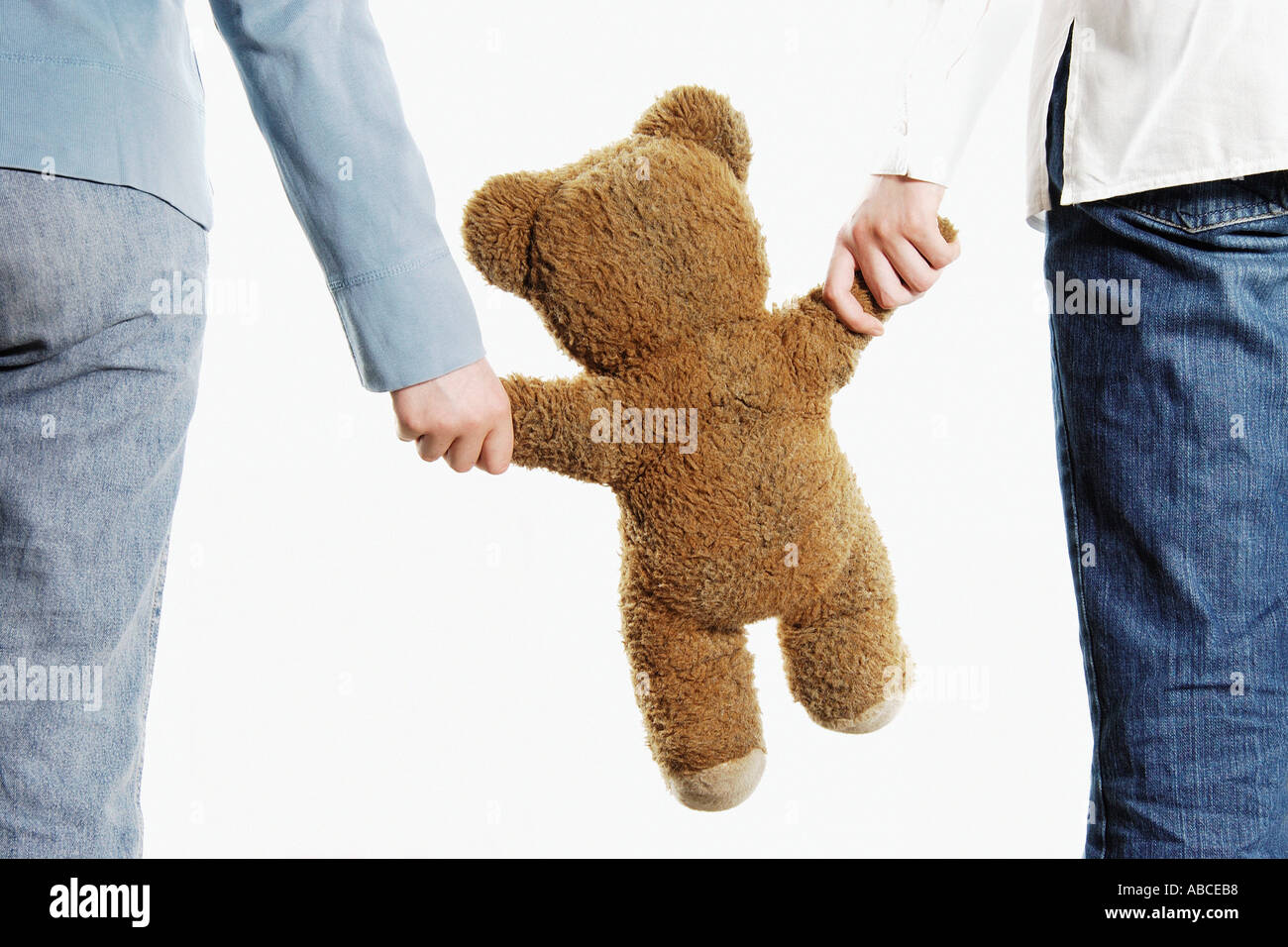 holding a teddy bear