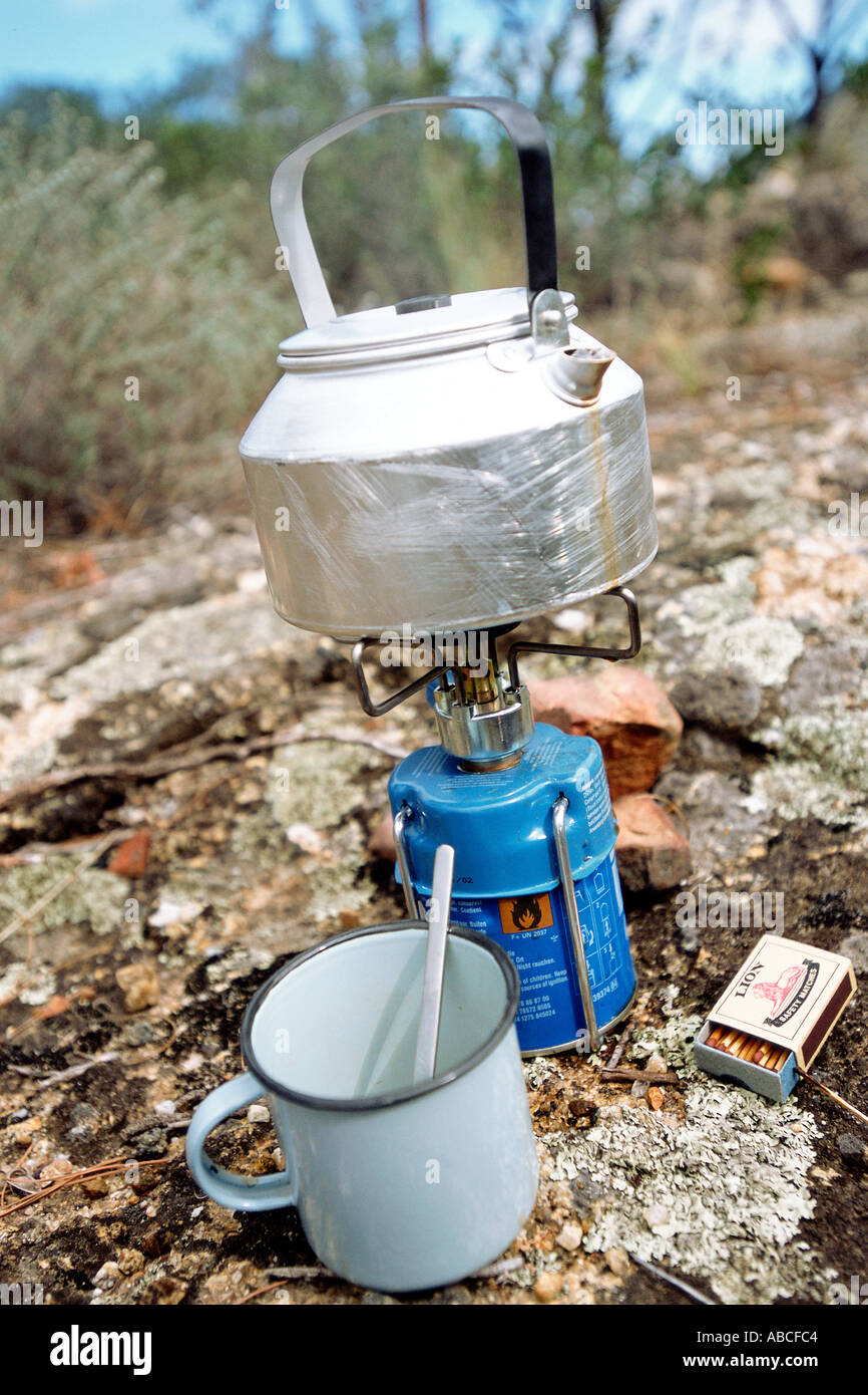 Kettle on a camping gas stove Stock Photo