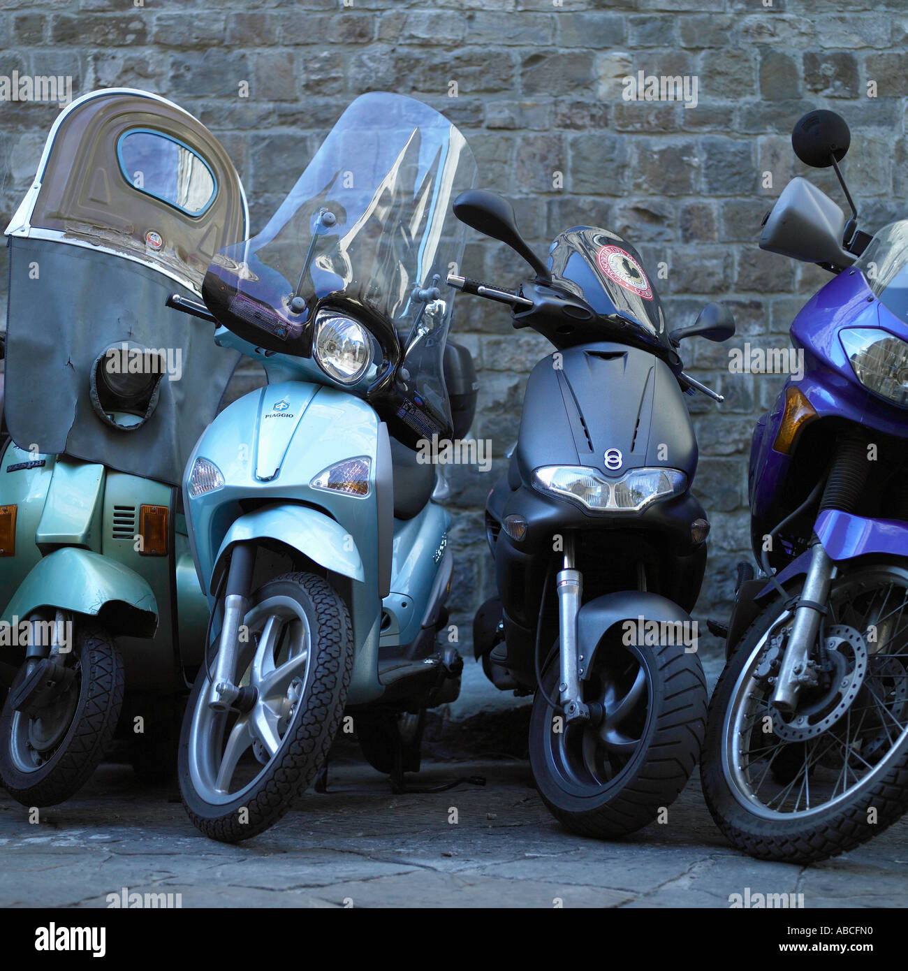 Italian scooters on street in Florence Stock Photo Alamy