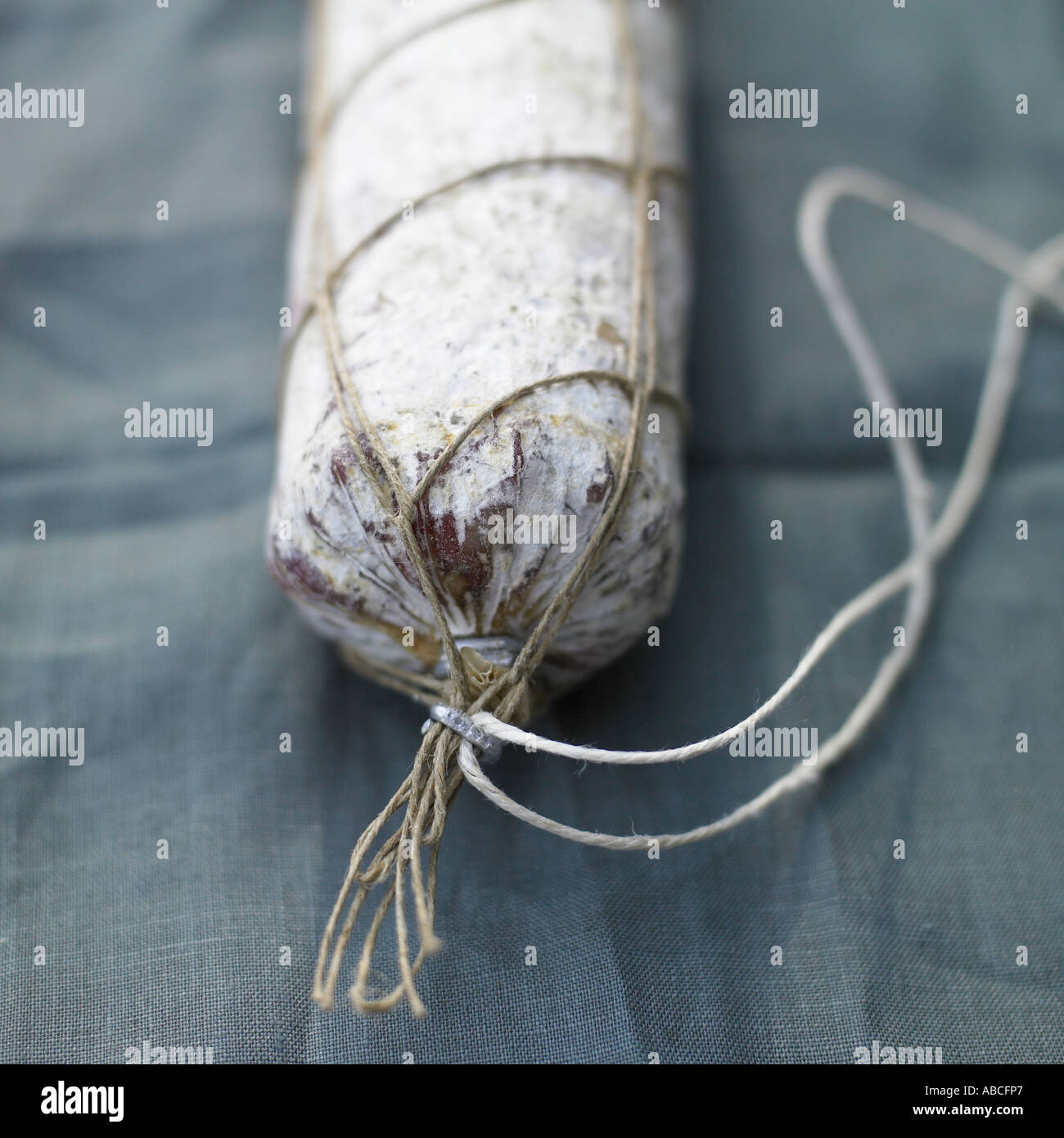 Italian salami on grey linen Stock Photo Alamy