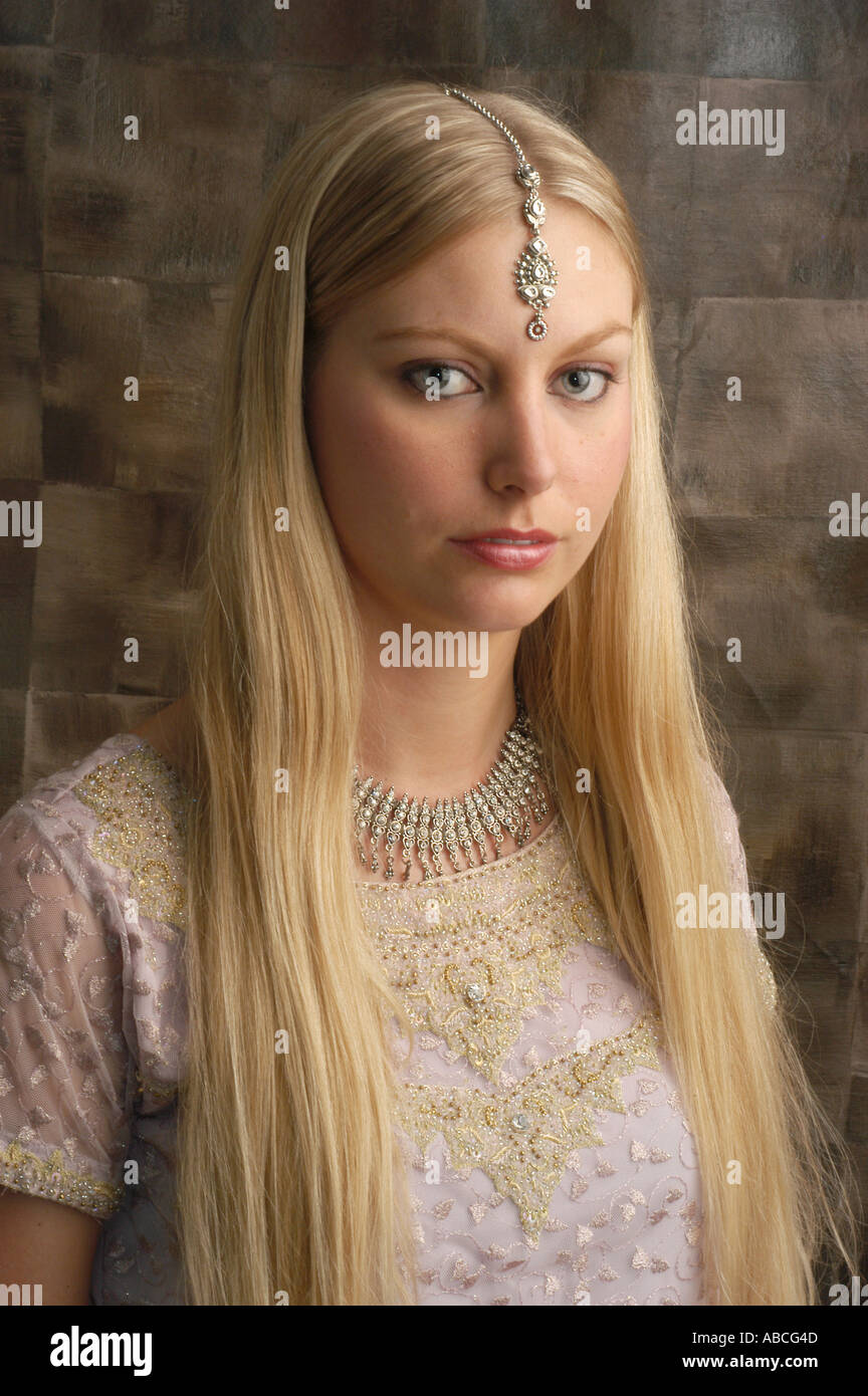 Young foreign woman Joanna wearing jewellery looking to the camera Stock Photo