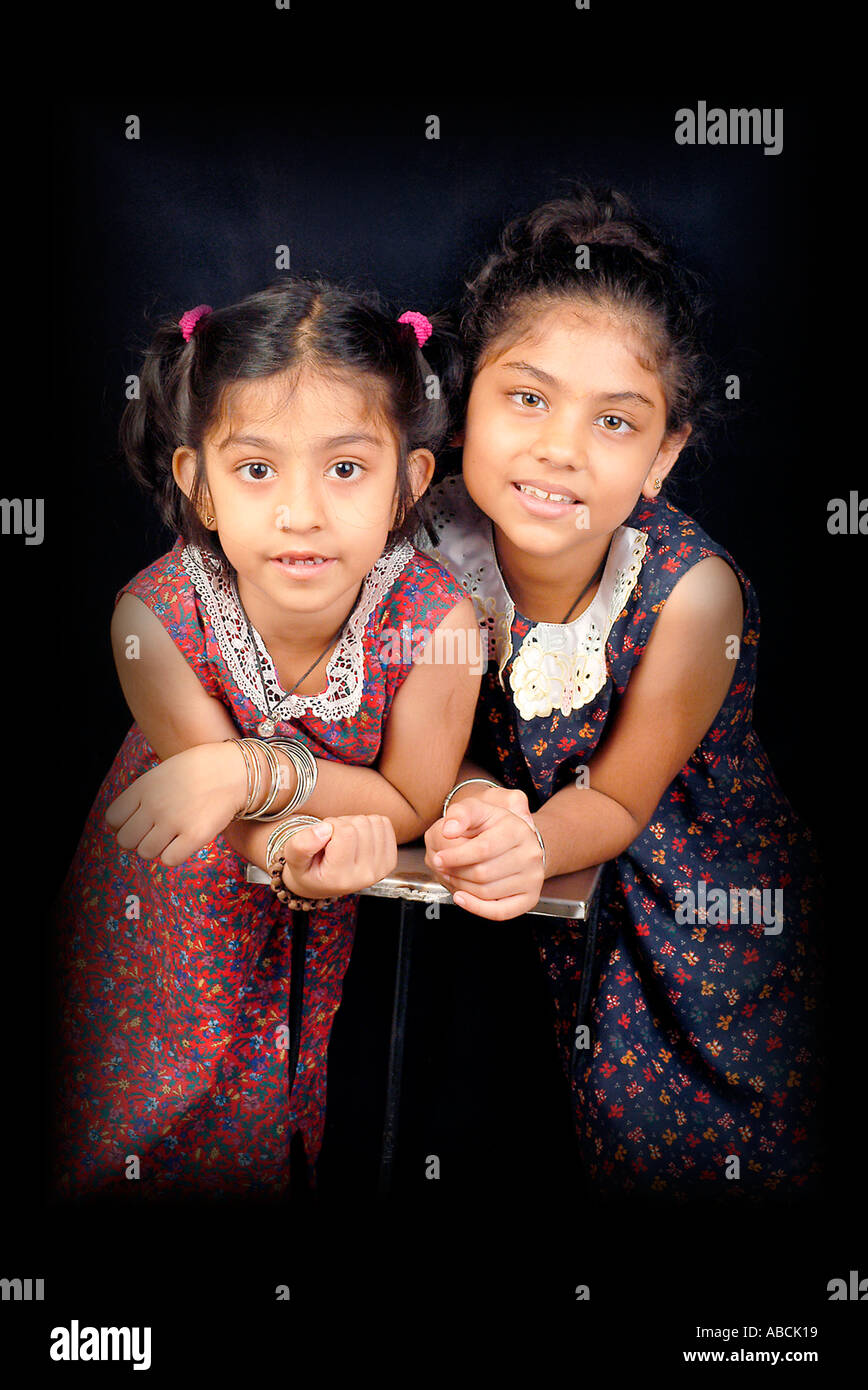 SSA70122 Young Indian Girls Nimi Disha looking at the camera with smile Stock Photo