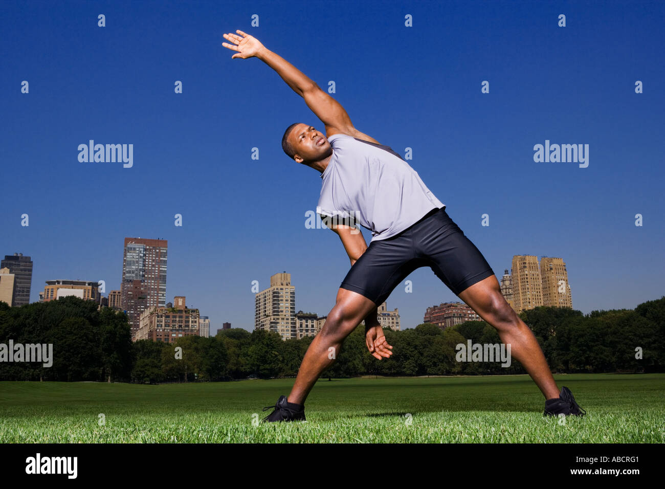 Man stretching in the park Stock Photo