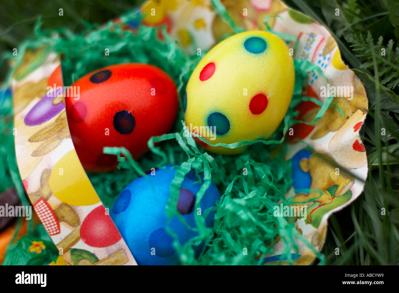 colourful easter eggs in basket Stock Photo